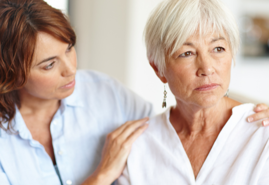 Hypothetical caregiver holding onto the shoulders of a POMALYST® (pomalidomide) patient with relapsed/refractory multiple myeloma
